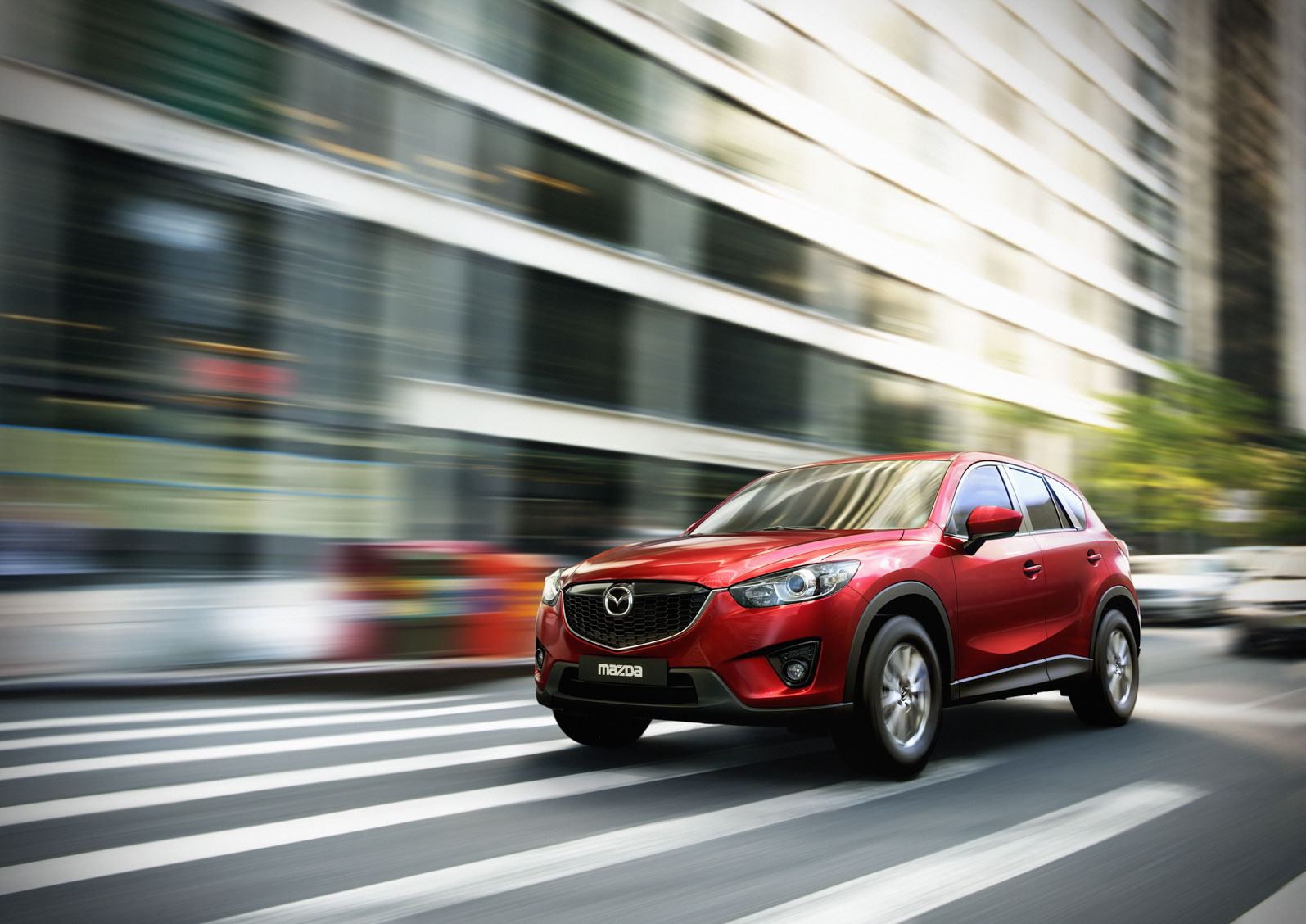 cx-5-2011-zealred-action-02-jpg300.jpg
